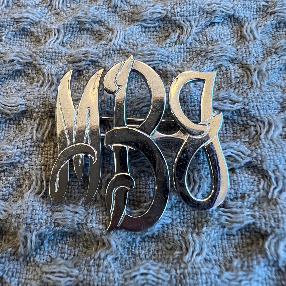 Vintage sterling silver monogrammed pin.